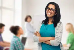 Woman smiling in a classroom