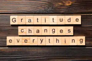 Tiles reading "gratitude changes everything"