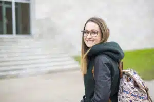 Teen girl walking into school