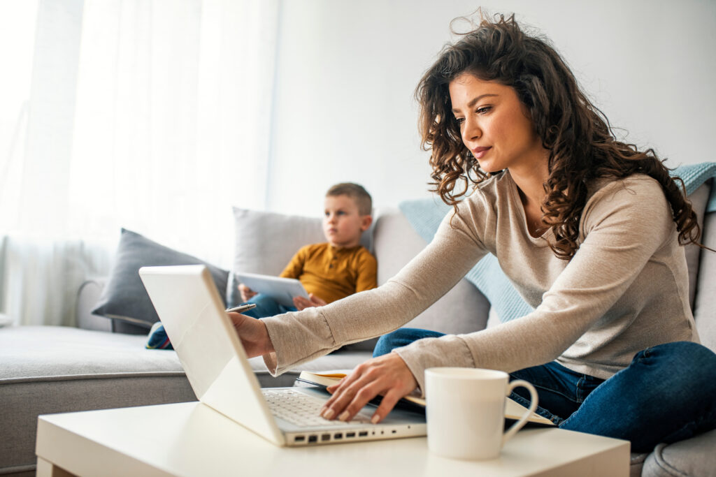 Mother looking at a computer